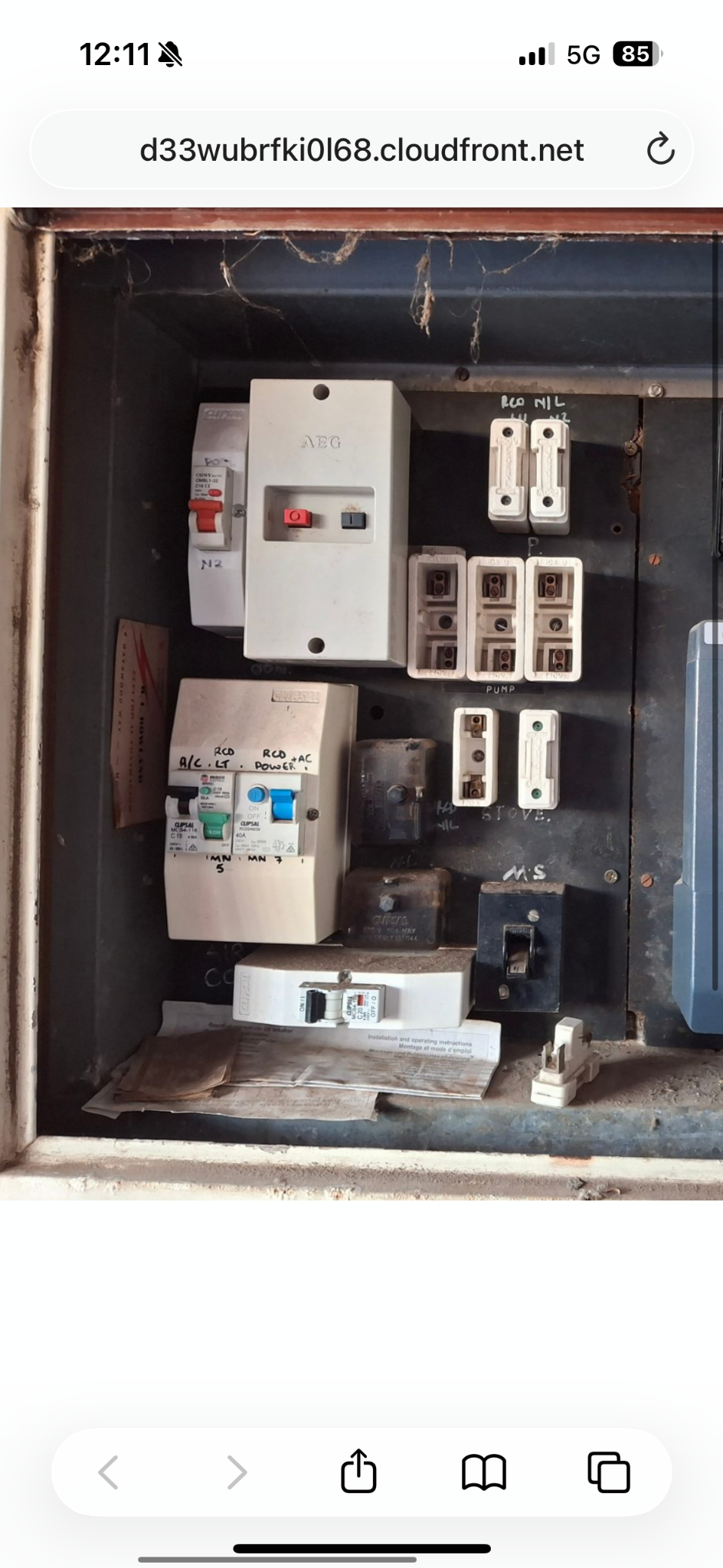 Older Greenwood switchboard with ceramic fuses and ageing RCDs